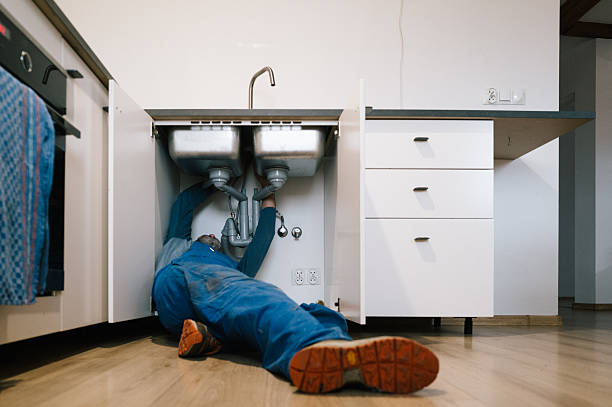 Professional Emergency Plumber technician working in Violet, LA
